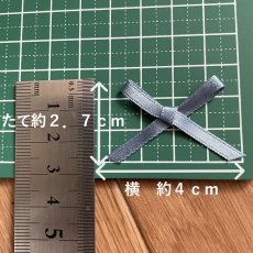 画像1: １０個！可愛いリボンモチーフ　ブルーグレー　ハンドメイドに　たて約2.7cm×横約4cm (1)