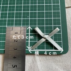 画像1: 10個！可愛いリボンモチーフ　若草色　ハンドメイドに　たて約3cm×横約4cm (1)